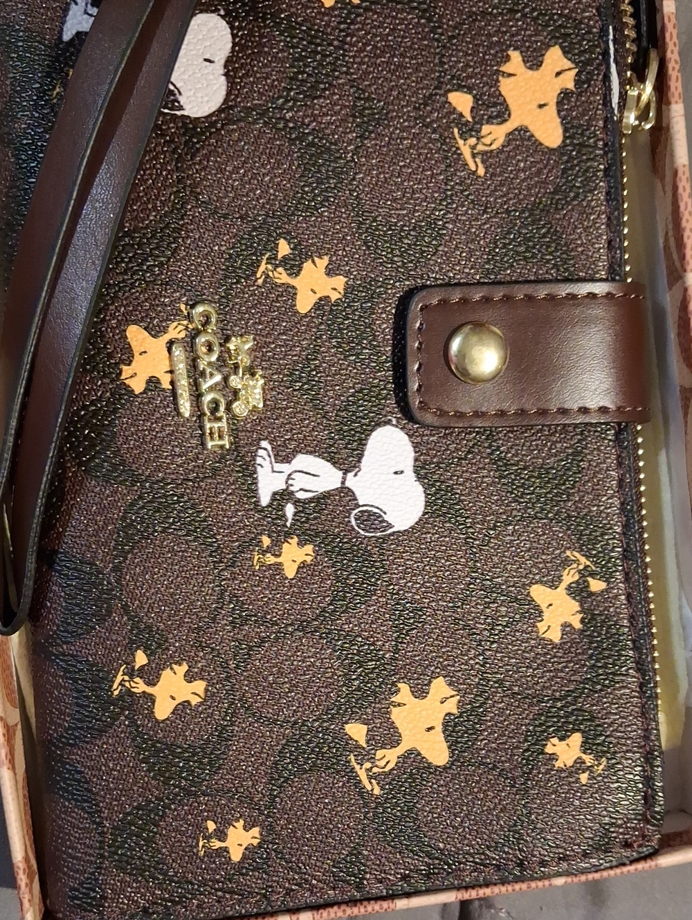 Coach Brown Signature Wristlet with White Snoopy & Yellow Woodstock Accents